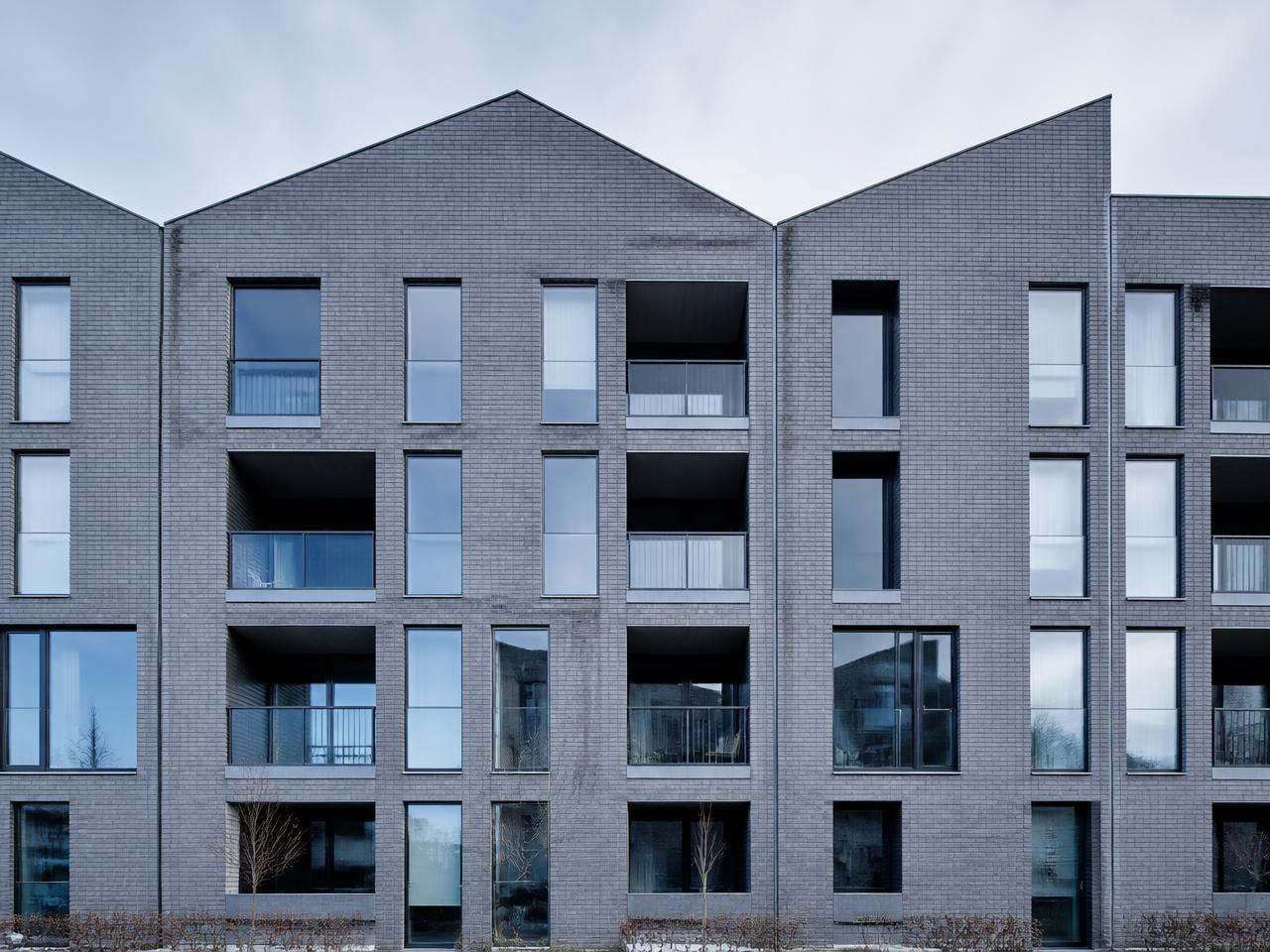 Fachada de un edificio residencial contemporáneo de varias unidades
